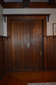 The dining room side of the same door, wormy chestnut.